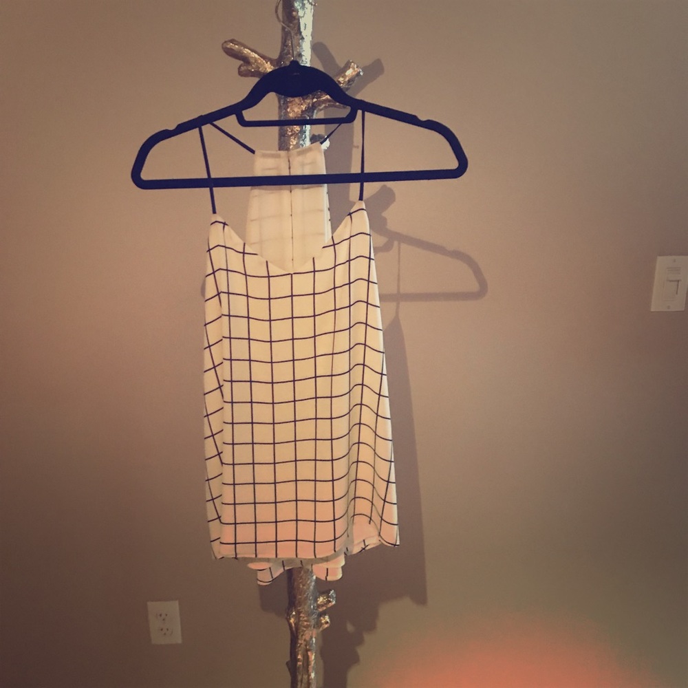 Cream and black tank